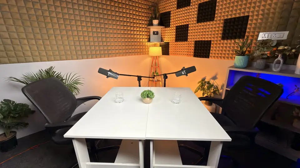 Camera rig with a monitor pointed at a podcast set